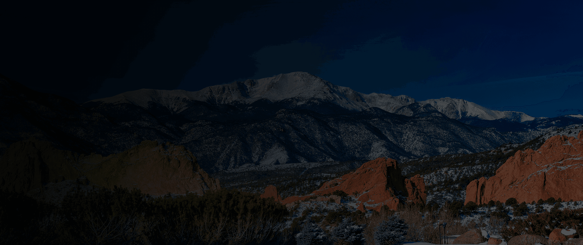 Pikes Peak and the Garden of the Gods at dusk